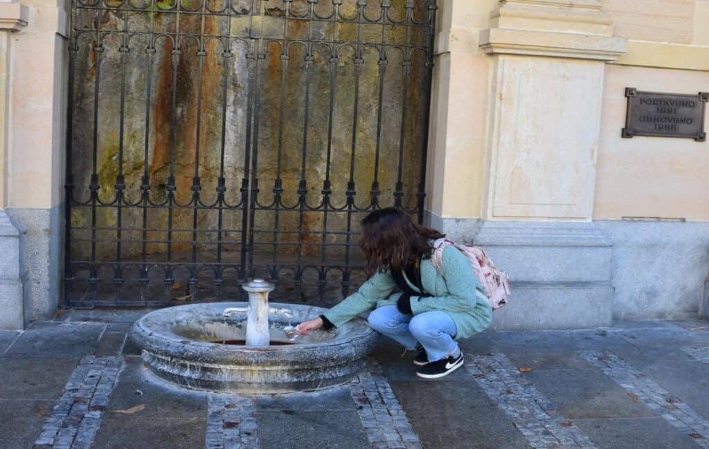 A visitor enjoying the hot springs at a spa in Karlovy Vary